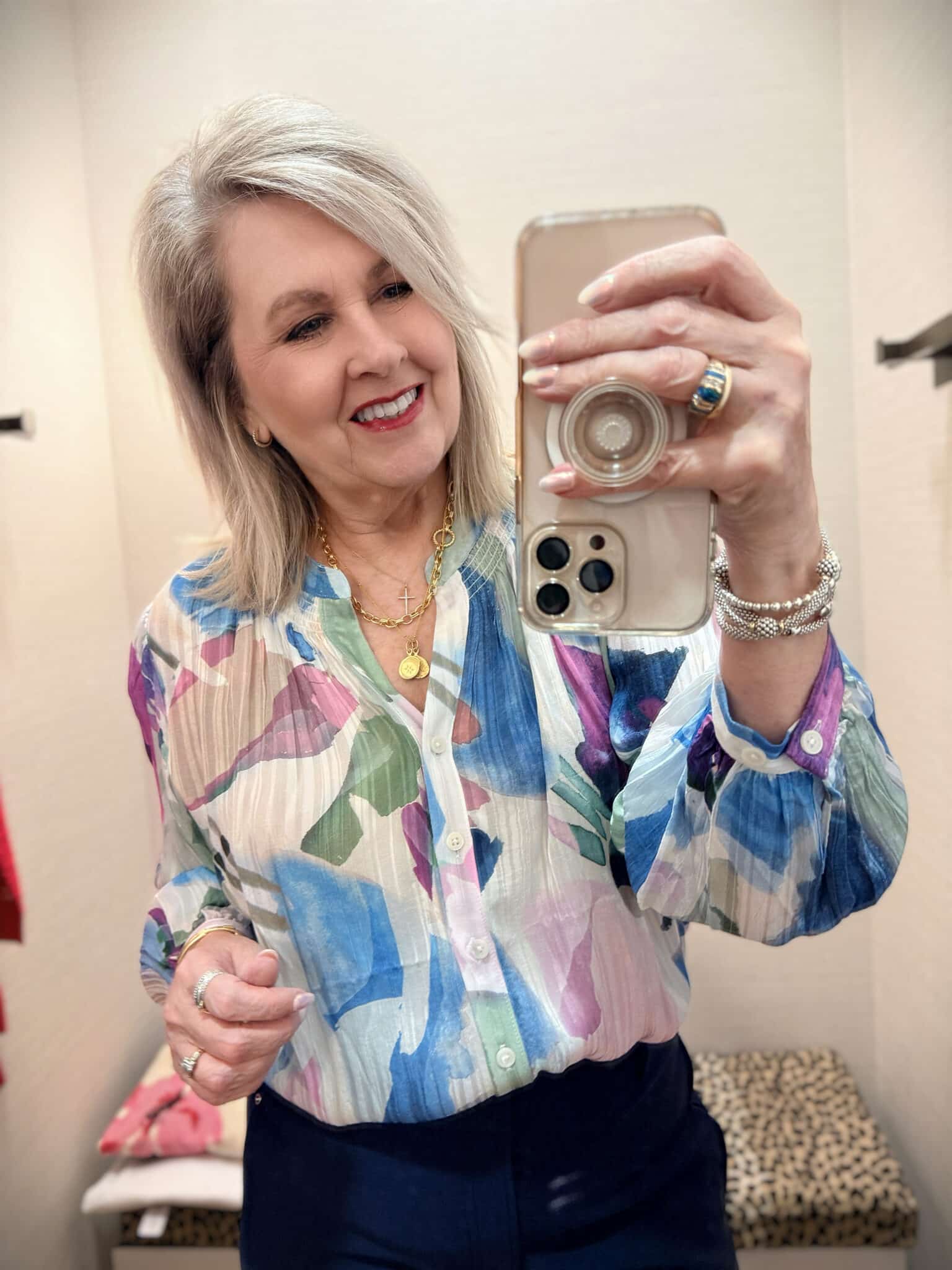 Tania wearing a colorful blouse from Chico's New Arrivals