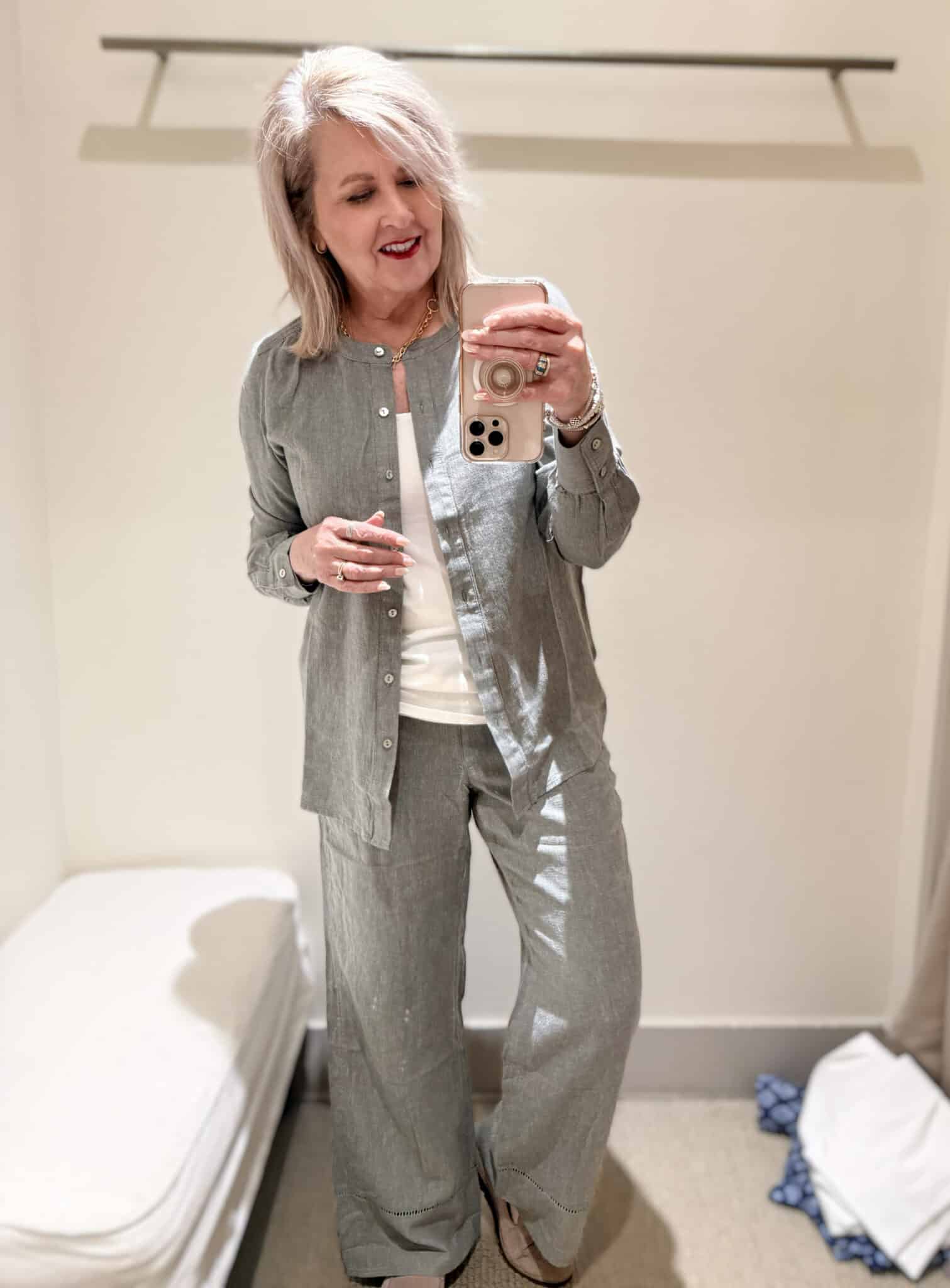 Tania wearing a green linen button shirt with and green linen pants from J.Jill