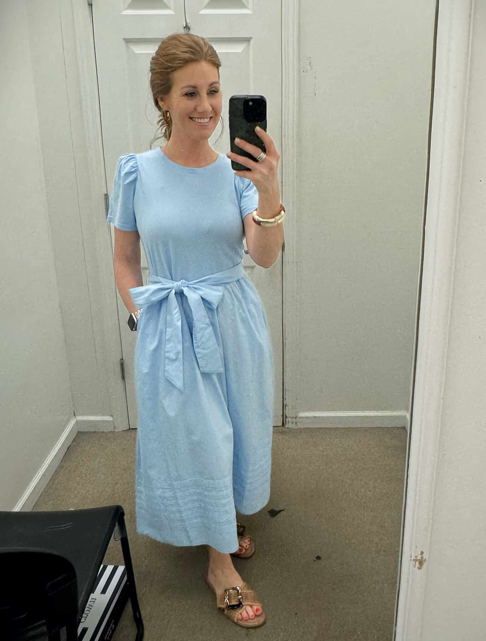 Stephanie (a petite lady) styling a blue t-shirt material Dress and sandals from Belk