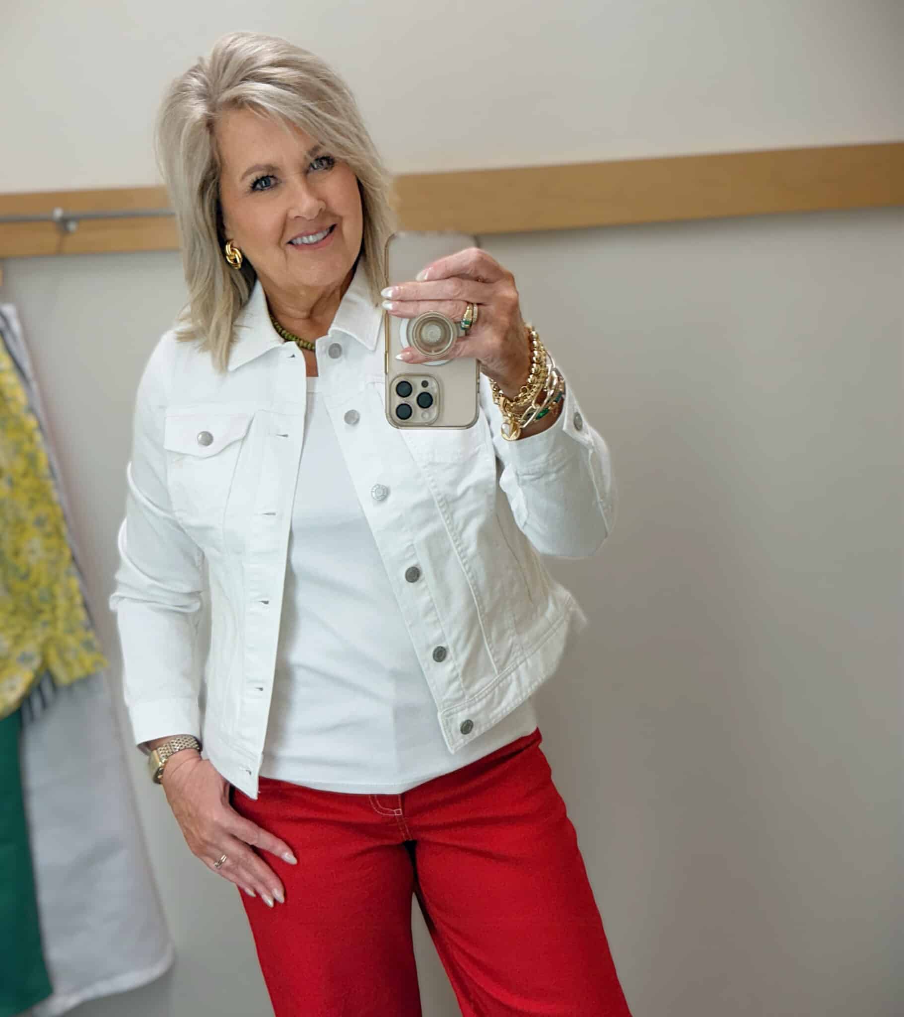 Tania wearing a white denim jacket with a white tank from Talbots