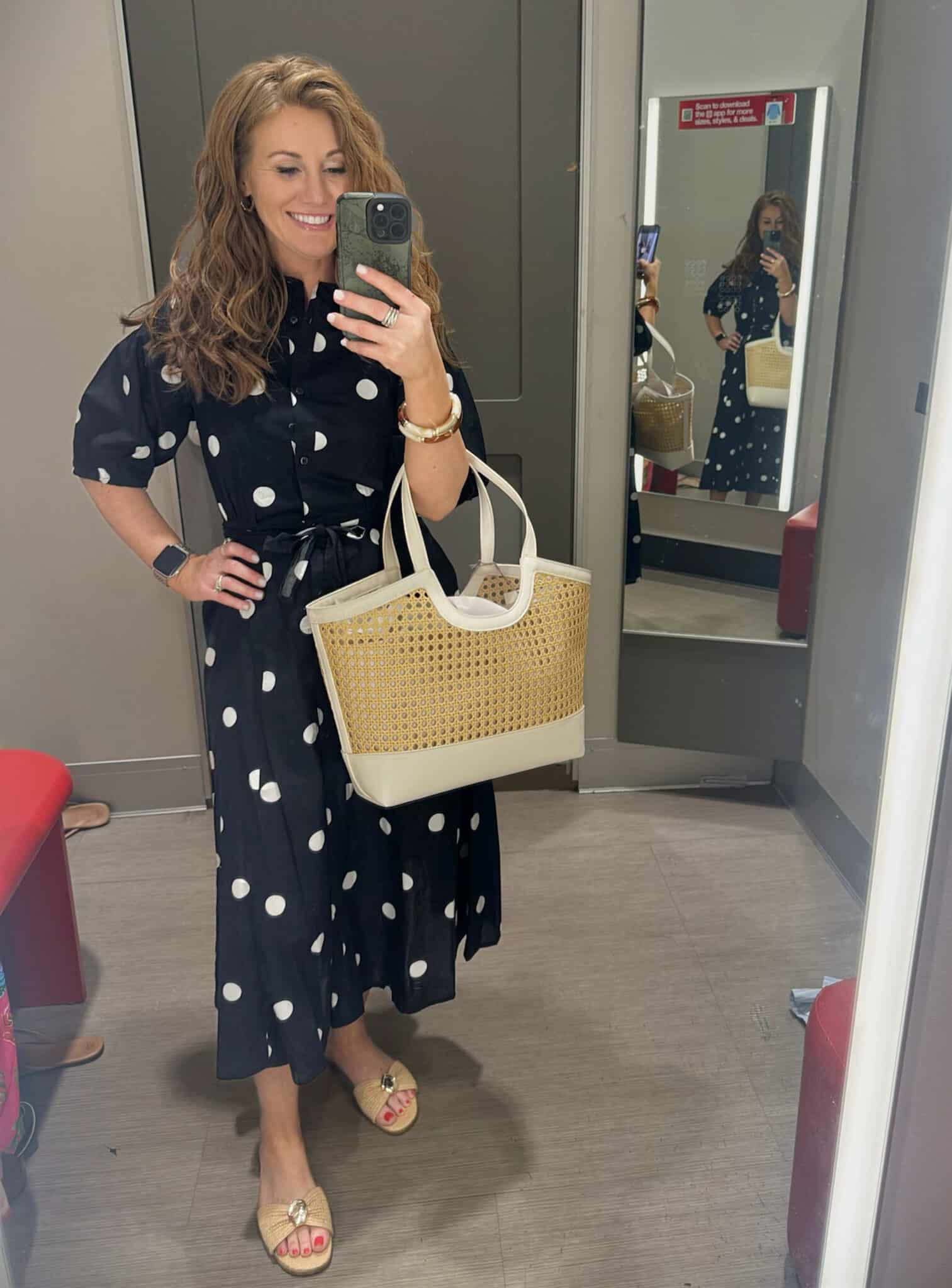 Stephanie wearing a polka dot midi dress from Target