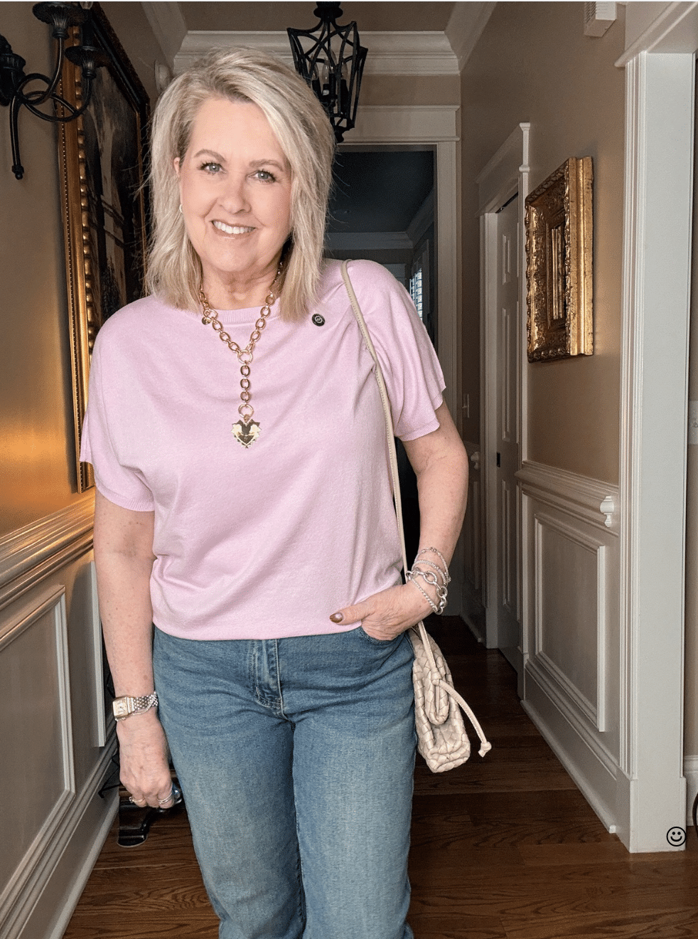 Woman wearing a light pink sweater